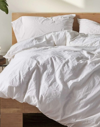 Kuo skiriasi glamžyta lininė ir glamžyta medvilninė patalynė?