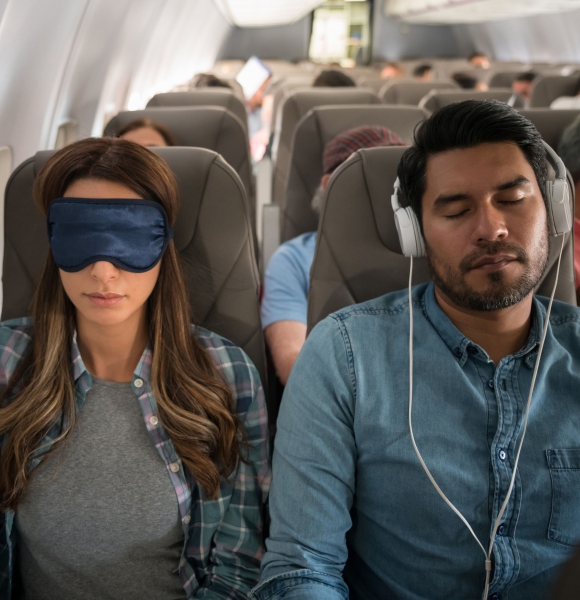 Kaip geriau miegoti lėktuve