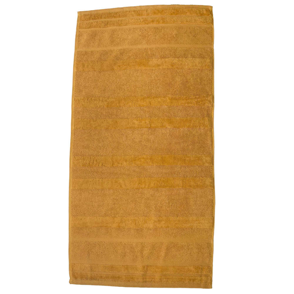 Vonios rankšluostis „Terry Mustard“. Rankšluosčiai, 50x90 cm, 70x140 cm. Elegantiškas garstyčių spalvos medvilninis vonios rankšluostis, suderinantis minkštumą ir didelį sugeriamumą, idealiai tinkantis gyvybingam ir rafinuotam vonios kambario įvaizdžiui.